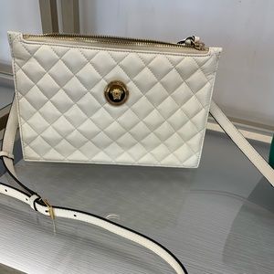 Authentic Versace Brand new clutch that turns into crossbody